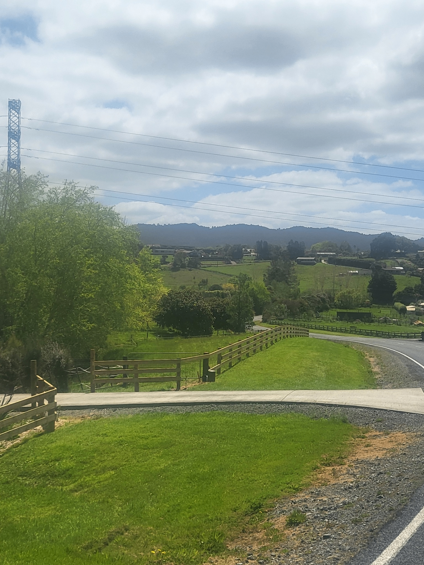 Roadside timber fencing across a rural Northland property