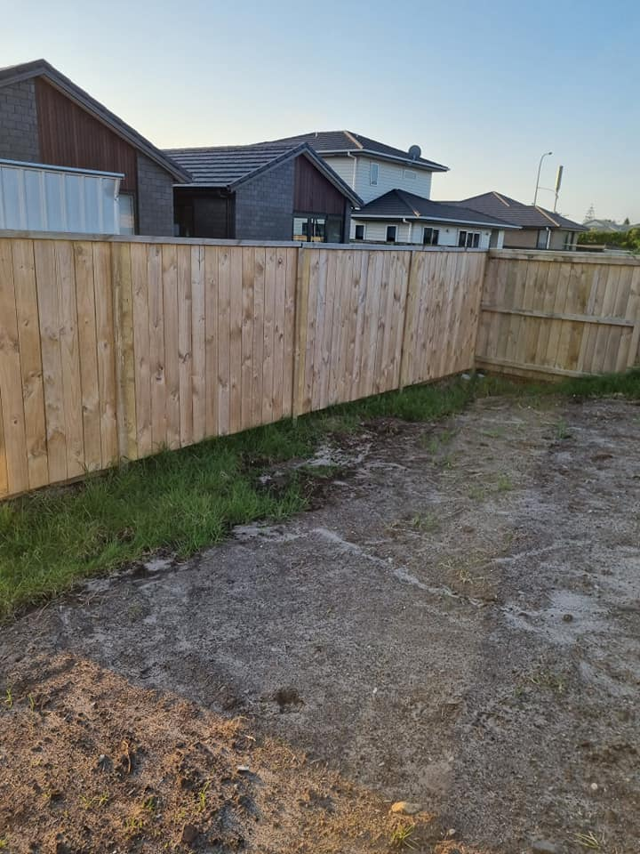 Residential timber paling fence between two properties